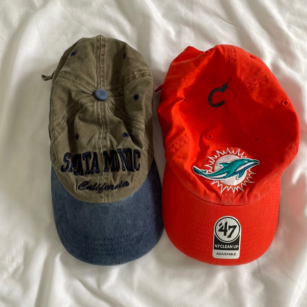 Santa Monica California Hat and orange 47 Miami dolphin’s hat.